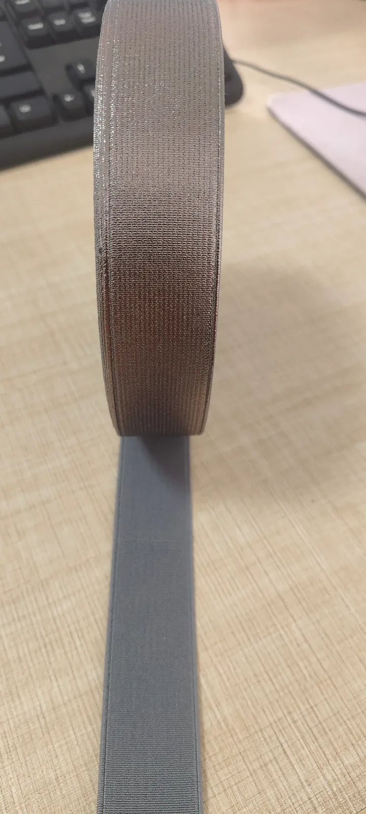 Single-sided silver foil finish elastic band detail