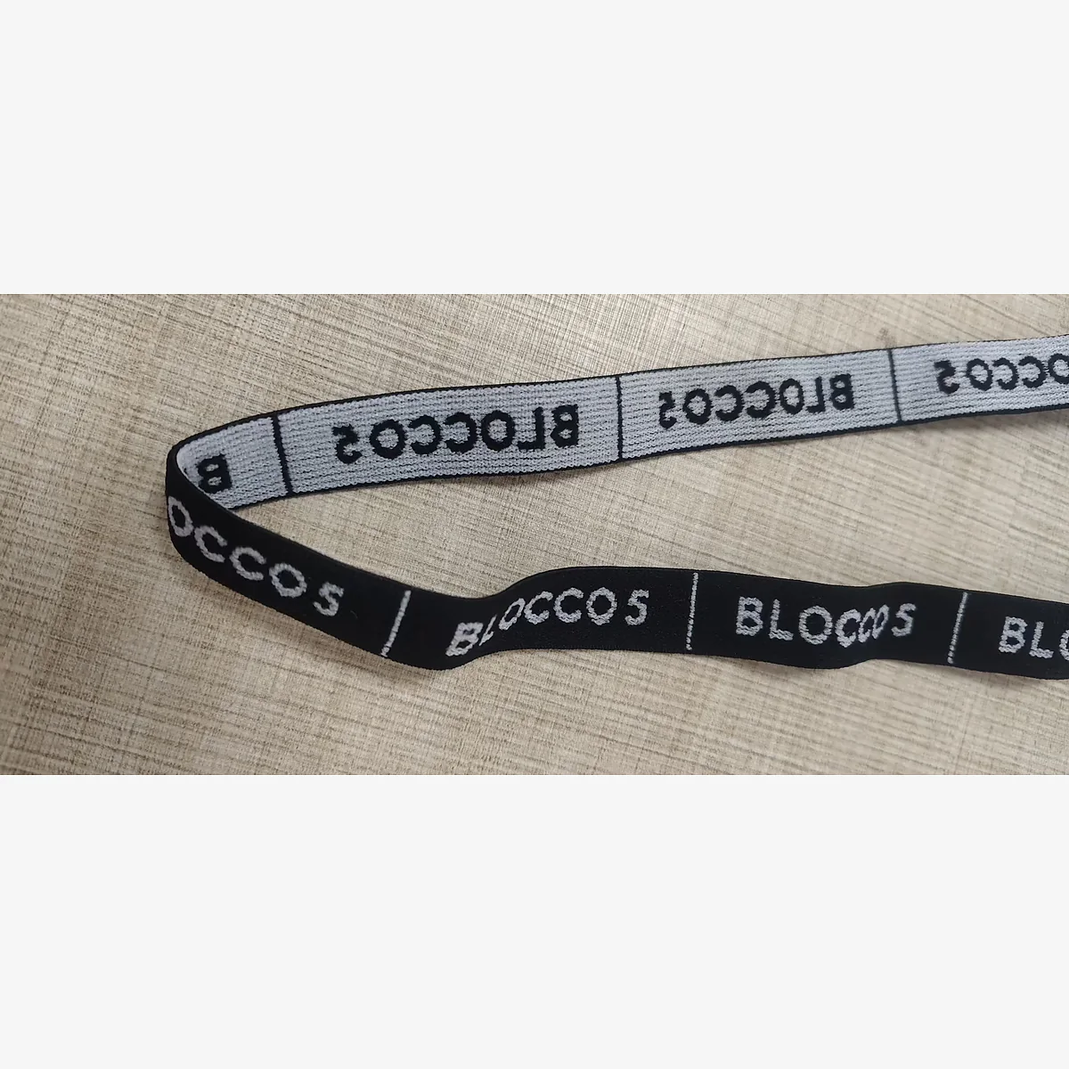 15mm custom logo jacquard elastic band sample showing woven structure and reverse side